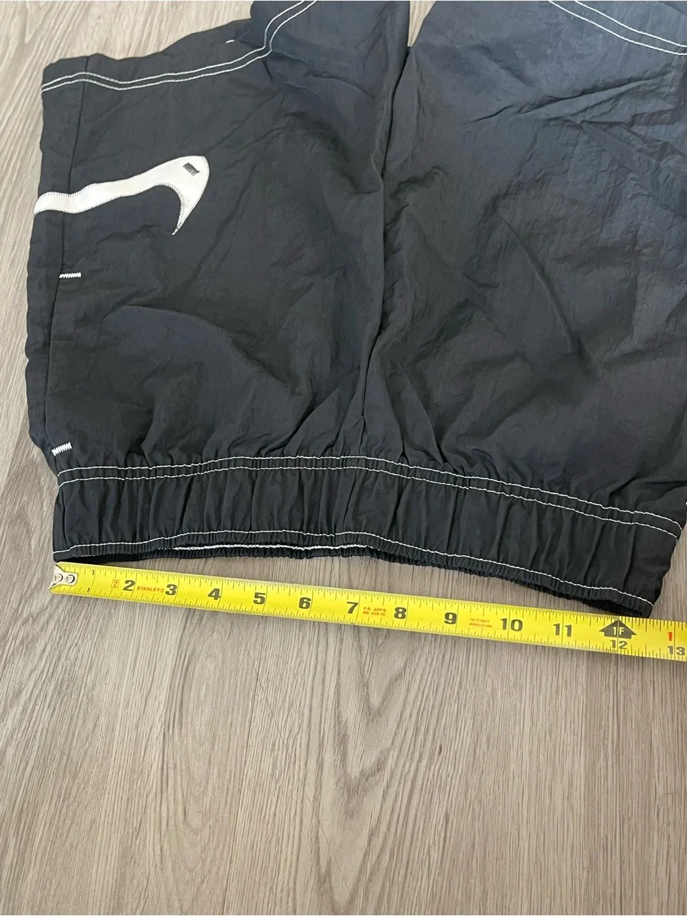 Nike Black Athletic Shorts with White Swoosh Accent